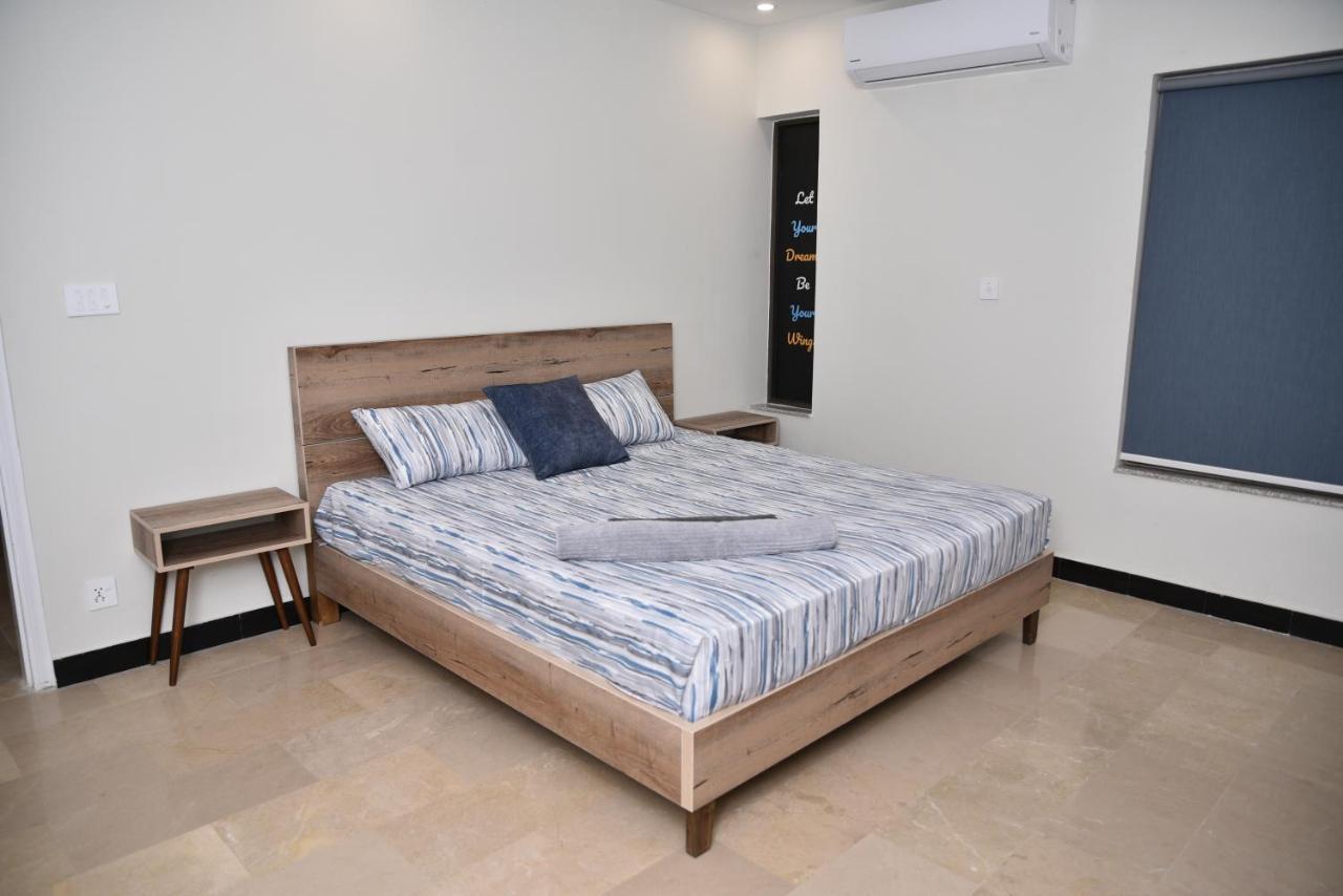 The Bliss Lejlighedshotel Rawalpindi Eksteriør billede